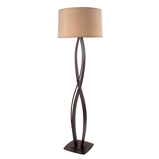 Hubbardton Forge Almost Infinity Floor Lamp with twisted dark brown metal base and beige drum shade.