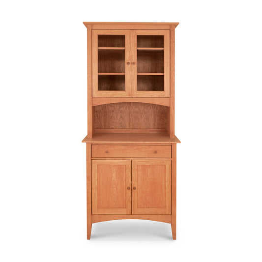 American Shaker Small 38" China Cabinet by Maple Corner Woodworks featuring a refined wooden design with top glass doors, an open middle shelf, and a bottom section with closed doors and drawer, showcasing exquisite Vermont craftsmanship.