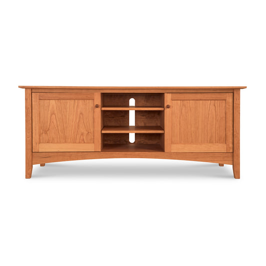 American Shaker 67" TV Stand, handcrafted from sustainable hardwoods, with two closed cabinets, center open shelves, and cable management cutout.