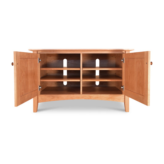 Handcrafted American Shaker 48" TV Stand by Maple Corner Woodworks featuring two open doors, two interior shelves, and a light brown finish, made from solid hardwoods with timeless classic design.