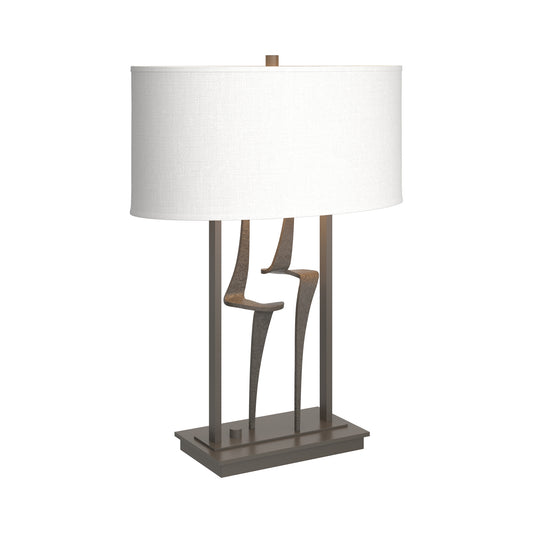 Antasia #1 Table Lamp by Hubbardton Forge with sculpted bronze base and rectangular white shade, American-made artisan lighting.