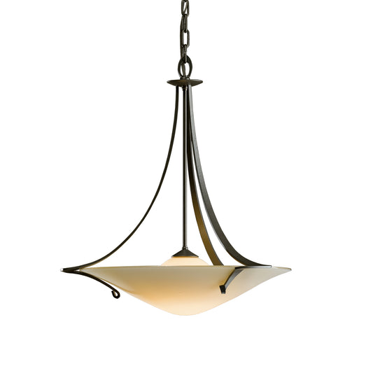 Hubbardton Forge Antasia Pendant with a striking curved white glass shade and sleek dark metal frame, elegantly suspended by a chain.