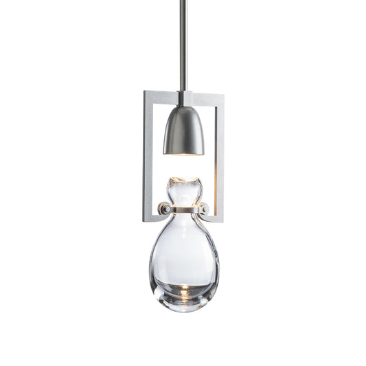 Hubbardton Forge Apothecary Mini Pendant with hand-blown clear teardrop glass shade and rectangular metal frame, showcasing elegant American craftsmanship.