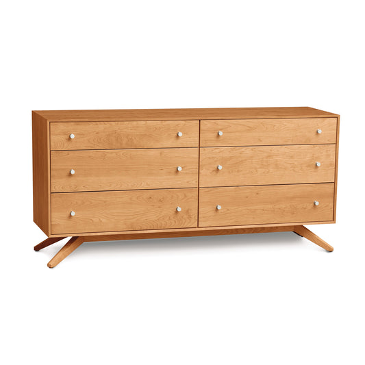 Astrid 6-Drawer Dresser by Copeland Furniture featuring six spacious drawers, sleek silver knobs, stylish angled legs, and a rich sustainable cherry finish.