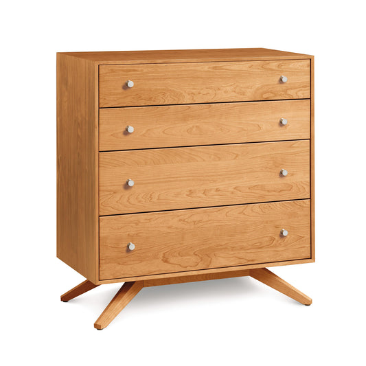 Astrid 4-Drawer Chest by Copeland Furniture with eco-friendly wood, angled legs, and sleek metal knobs.