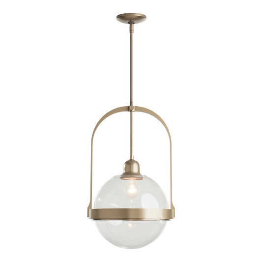 Atlas Mini Pendant with clear glass globe and brass frame, crafted by Hubbardton Forge, elegantly hanging from a hand-forged steel rod.