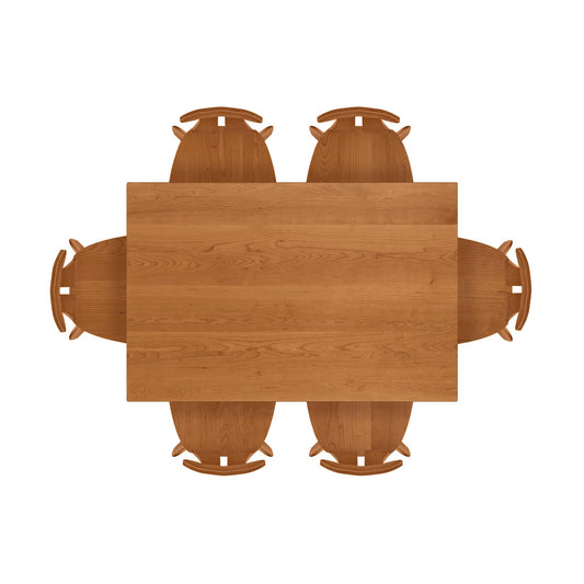 Audrey Solid Top Dining Table by Copeland Furniture with six matching chairs, highlighting the table’s elegant design and craftsmanship.