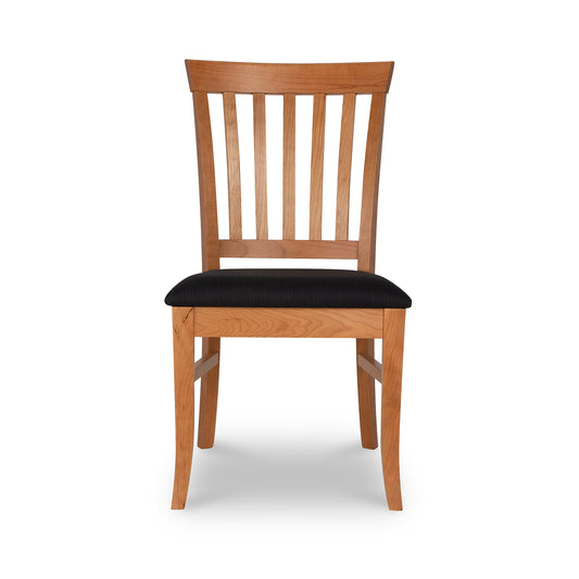 Bistro Dining Chair by Lyndon Furniture with a slatted backrest and black cushioned seat, expertly handcrafted in Vermont.