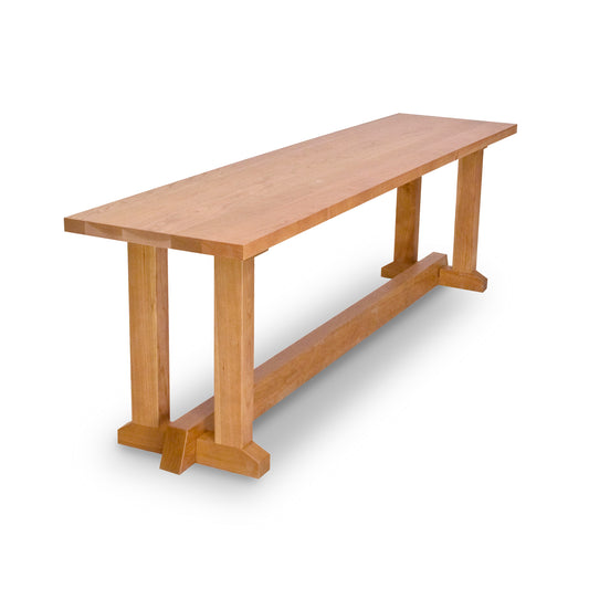 Boston Trestle Bench by Lyndon Furniture, handcrafted in Vermont from solid, sustainably sourced wood, featuring a flat seat and sturdy trestle legs.