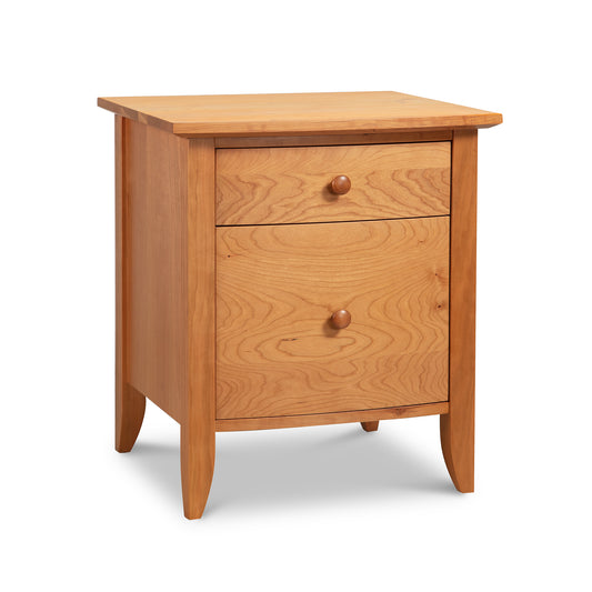 Lyndon Furniture Bow Front 1-Drawer Nightstand with Door, handcrafted from sustainable wood, features a curved front, round knob, and elegant tapered legs.