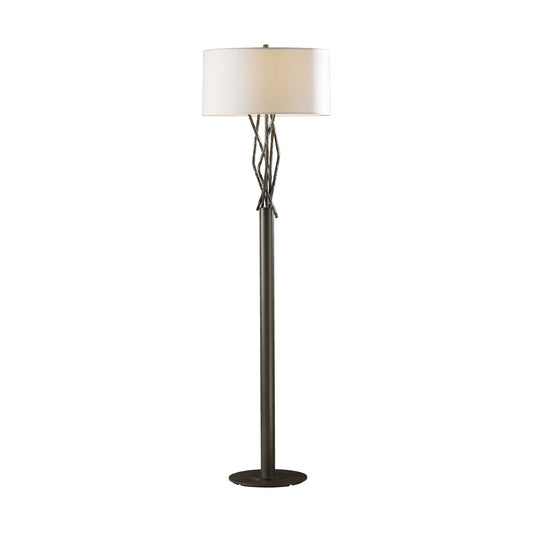Hubbardton Forge Brindille Floor Lamp with twisted dark metal branches and a white round lampshade.