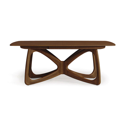 Oval Copeland Butterfly Extension Dining Table with unique X-base, crafted from North American hardwoods.