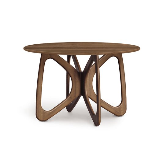 Copeland Furniture Butterfly Round Dining Table with Solid Top and Distinctive Intertwined Geometric Hardwood Base.