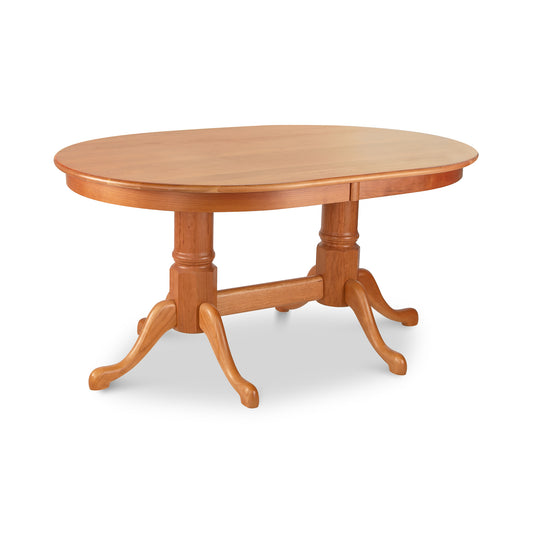 Cabriole Oval Double Pedestal Solid Top Table by Lyndon Furniture with two graceful pedestals and elegantly curved legs, crafted from quality solid wood.