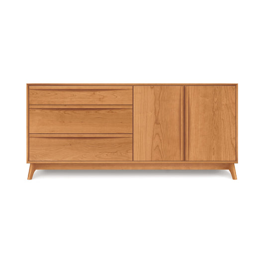Copeland Catalina buffet with three drawers and two doors, crafted from solid wood in a mid-century modern style with short legs.