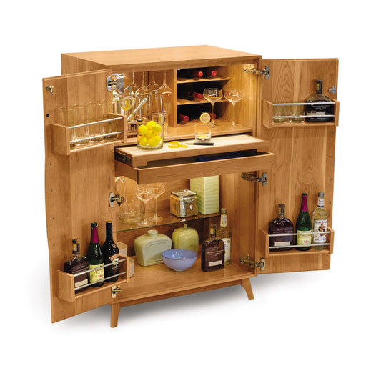 Catalina Bar Cabinet by Copeland Furniture crafted from rich hardwood, featuring interior wine storage and space for glassware and bar accessories.