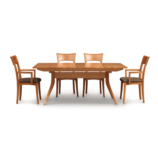 Copeland Catalina Trestle Extension Table with four matching chairs, expertly crafted from solid American hardwood.