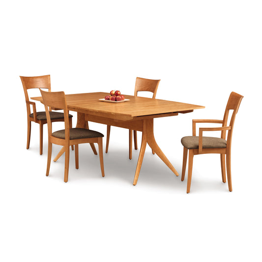 Catalina Trestle Extension Table by Copeland Furniture in solid American hardwood with four matching chairs, showcasing fine craftsmanship.