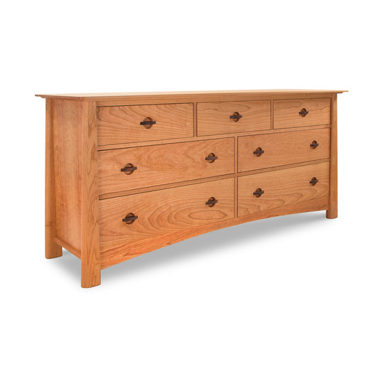 Cherry Moon 7-Drawer Dresser by Maple Corner Woodworks, with elegant curved sides and sleek minimalistic metal handles, crafted from sustainable materials.