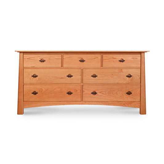 Cherry Moon 7-Drawer Dresser by Maple Corner Woodworks, showcasing seven spacious drawers and sleek metal handles; an exquisite example of eco-friendly luxury furniture design blending elegance with sustainability.
