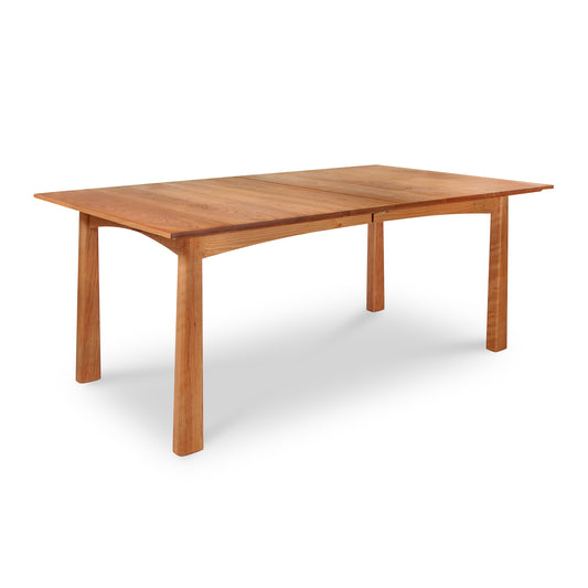 Cherry Moon Extension Dining Table by Maple Corner Woodworks in solid wood with clean lines and a rectangular shape, featuring a beautiful finish and four sturdy legs.