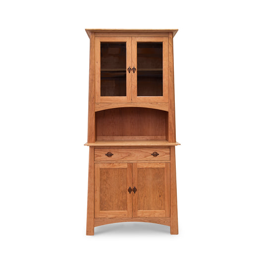 Cherry Moon Small China Cabinet by Maple Corner Woodworks, elegantly crafted from natural hardwoods; features two glass-paneled upper doors, open middle shelf, and two solid lower doors with sleek black handles.