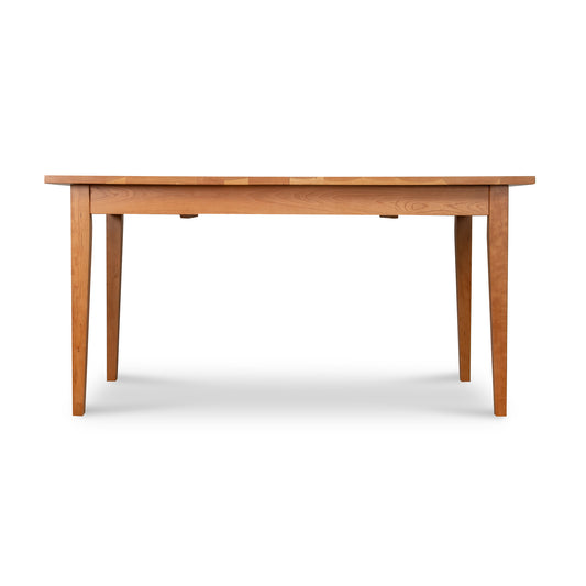 Lyndon Furniture Classic Shaker Butterfly Extension Table crafted from solid wood, highlighting its elegant design and craftsmanship.