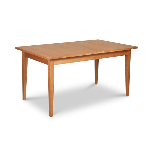 Classic Shaker Butterfly Extension Table by Lyndon Furniture, featuring solid wood construction and smooth light brown finish, highlighted in a clear product-focused image.