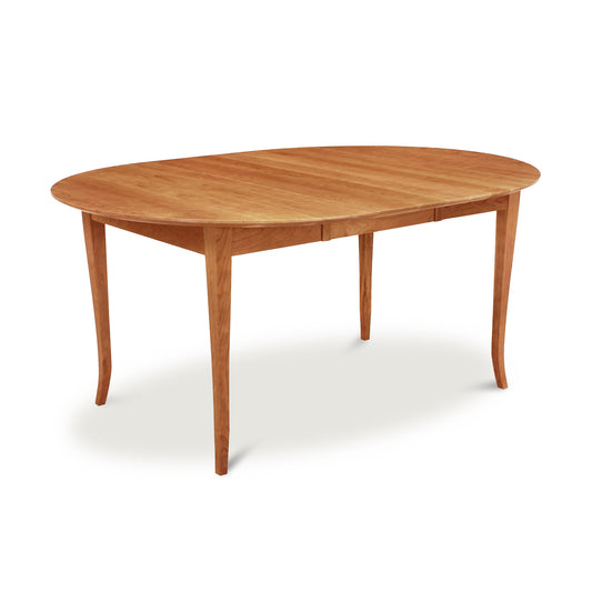 Classic Shaker Flare Leg Round Extension Table by Lyndon Furniture, crafted from solid hardwood with elegant curved legs and a smooth, expandable top.