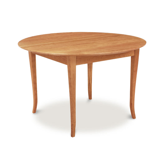 Classic Shaker Flare Leg Round Solid Top Table by Lyndon Furniture featuring elegant tapered legs and smooth wood finish.