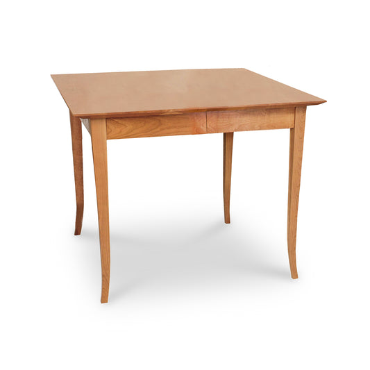 Classic Shaker Flare Leg Square Extension Table by Lyndon Furniture, featuring elegant tapered legs and a smooth, natural wood finish.