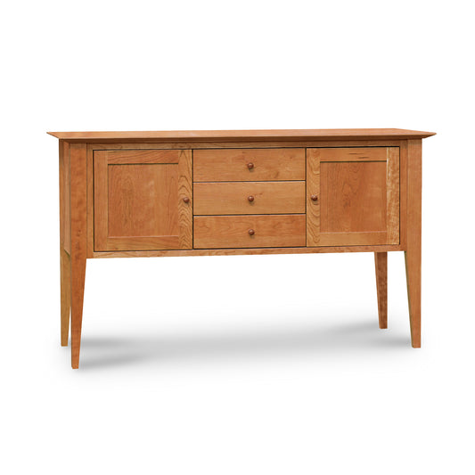 Lyndon Furniture Classic Shaker Small Buffet featuring two doors, three drawers, and elegant tapered legs in a timeless shaker design.