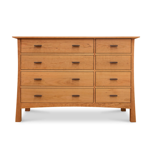 Contemporary Craftsman 8-drawer dresser by Vermont Furniture Designs with natural wood finish, rectangular handles, and tapered legs.