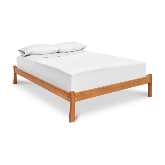 Contemporary Craftsman Studio-Style Platform Bed by Vermont Furniture Designs with white mattress and pillows.