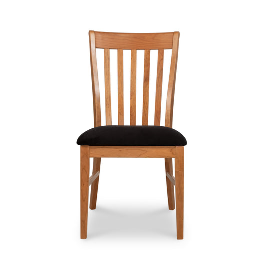 Country Shaker Chair by Vermont Woods Studios with solid wood construction, slatted backrest, and ergonomic black cushioned seat, front view.