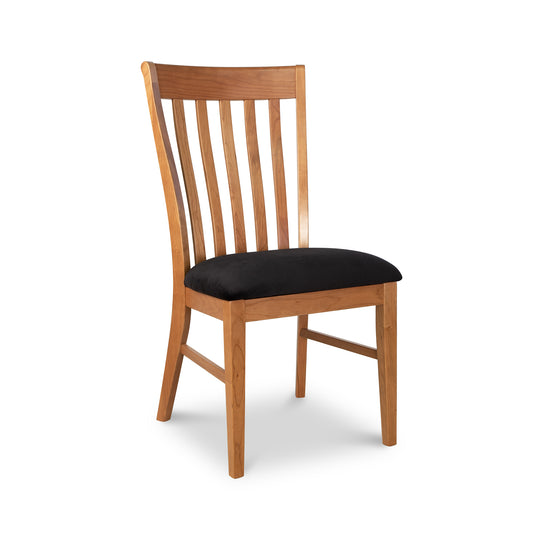 Country Shaker Chair by Vermont Woods Studios with solid wood frame, black cushioned seat, and vertical slat backrest.