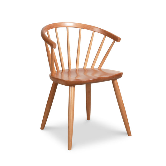 Dover Curveback Windsor Chair by Vermont Woods Studios with vertical slats and tapered legs, showcasing an elegant design.