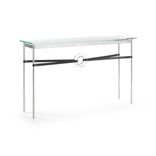 Modern Equus Console Table by Hubbardton Forge with a sleek glass top, slim metal legs, and handcrafted geometric details.