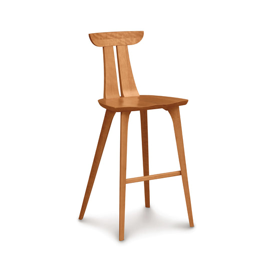 Estelle Bar Stool by Copeland Furniture, showcasing a curved backrest and angled legs in American hardwood with mid-century design.