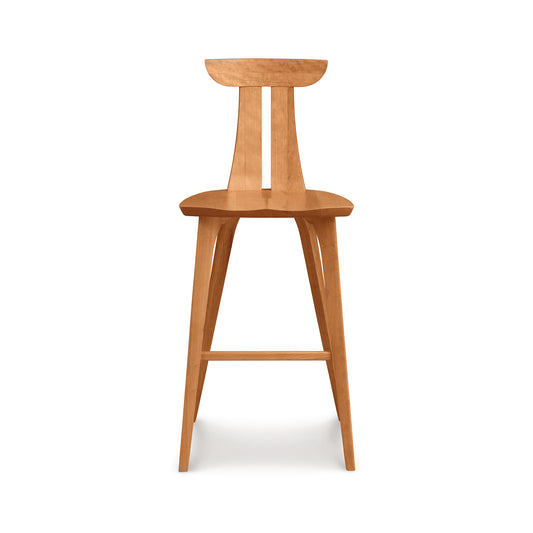 Estelle Bar Stool by Copeland Furniture in American hardwood, featuring a curved backrest and angled legs in mid-century modern design.