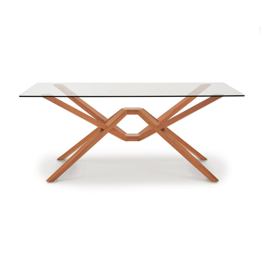 Exeter Rectangular Glass Top Table by Copeland Furniture with unique angled intersecting legs and central hexagonal design, showcasing modern craftsmanship.