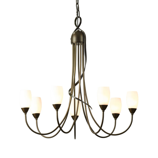 Flora 7-Arm Chandelier by Hubbardton Forge with elegant bronze arms and white glass shades, showcasing exquisite craftsmanship.