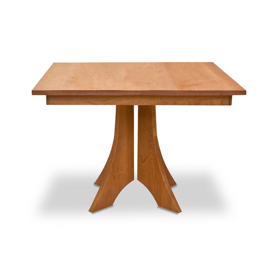 Lyndon Furniture Hampton Split Pedestal Square Table with distinctive angled legs and a sleek, modern design.