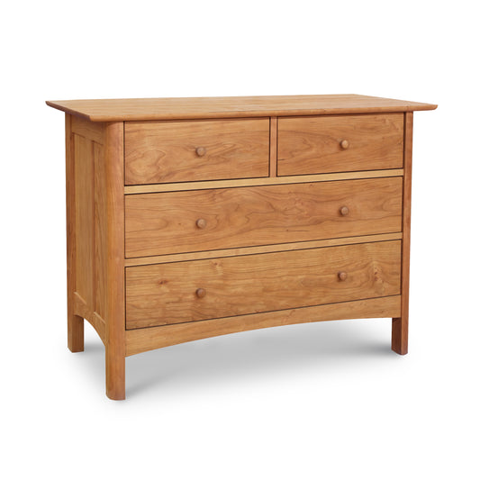 Heartwood Shaker 4-Drawer Dresser in solid wood with round knobs, crafted by Vermont Furniture Designs, featured against a plain white background.