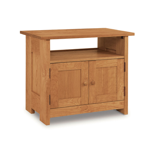Vermont Furniture Designs Homestead Small TV Stand, solid wood, features two closed doors and an open shelf.