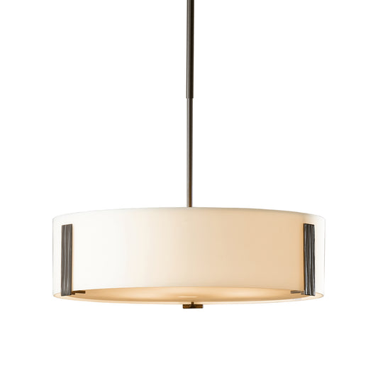 Modern Hubbardton Forge Impressions Pendant with round white fabric shade and sleek black metal accents suspended on a single pole.