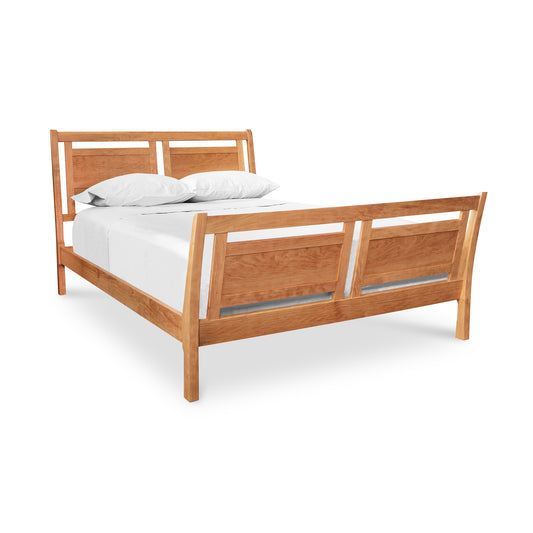 Incline Sleigh Bed by Vermont Furniture Designs, featuring a handcrafted minimalist wooden frame with headboard and footboard.