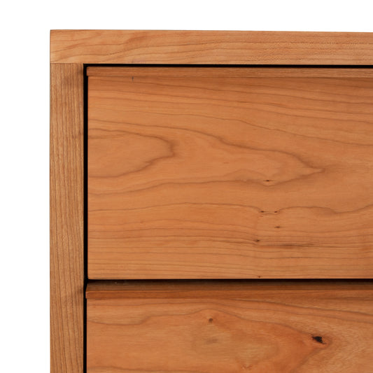 Kipling 8-Drawer Dresser by Vermont Furniture Designs, solid wood with natural finish and customizable edges, showcasing a unique grain.