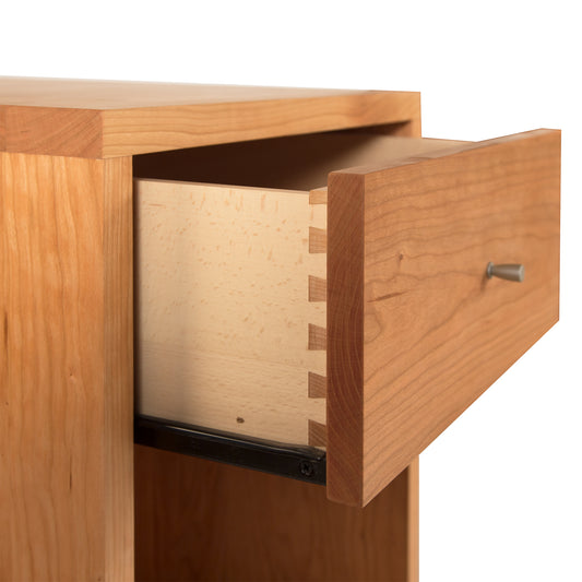 Larssen 1-Drawer Nightstand highlighting dovetail joints, sleek metal handle, and modern design in natural hardwood by Vermont Furniture Designs.
