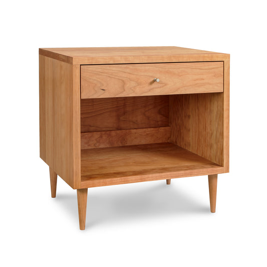Larssen 1-Drawer Wide Nightstand in hardwood showcases mid-century design with tapered legs, a knobbed drawer, and convenient shelf.storage.